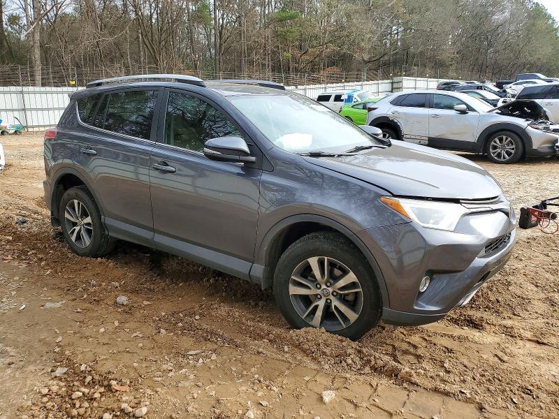 Photo 4 from auction – 2018 TOYOTA RAV4 with VIN 2T3WFREV7JW516922