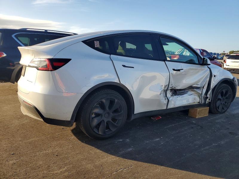 Photo 3 from auction – 2023 TESLA MODEL Y with VIN 7SAYGAEE3PF772435