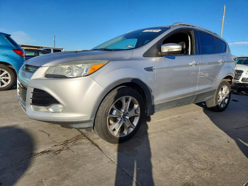 FORD ESCAPE TIT 2014 with VIN 1FMCU0JXXEUC90286 - Photo from auction