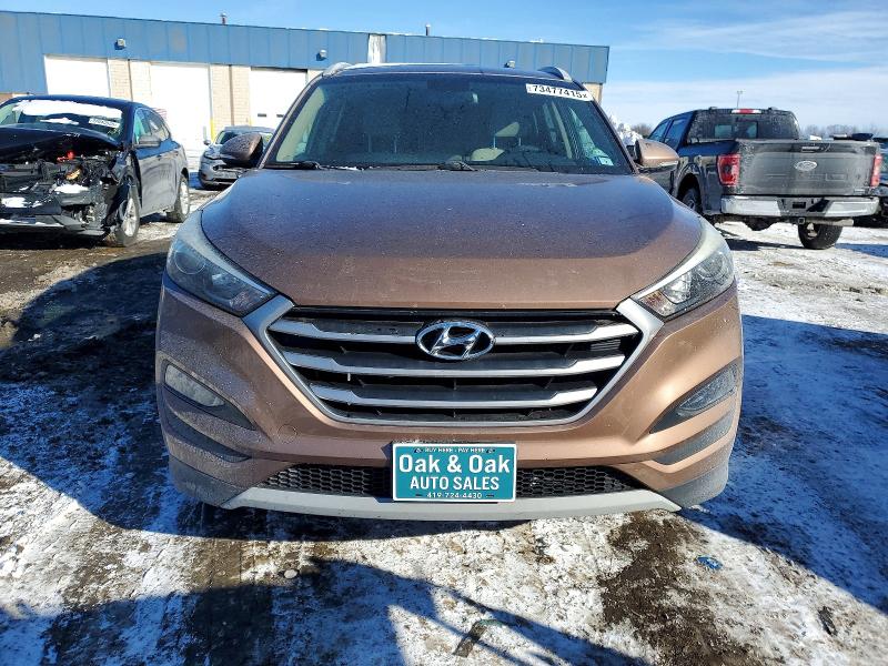 Photo 5 from auction – 2017 HYUNDAI TUCSON LIM with VIN KM8J3CA21HU379717
