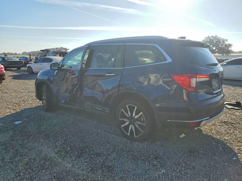 Photo 2 from auction – 2022 HONDA PILOT ELIT with VIN 5FNYF6H09NB029076