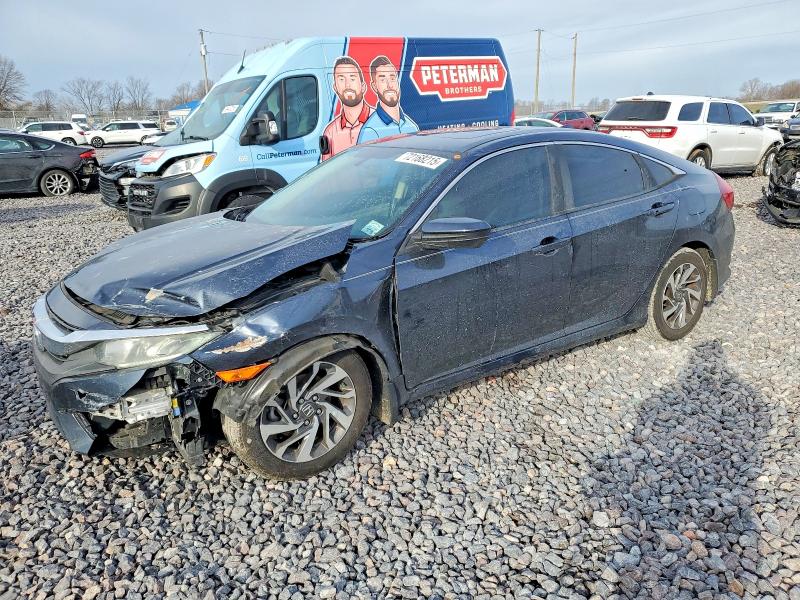 HONDA CIVIC 2018 with VIN 19XFC2F70JE029685 - Photo from auction
