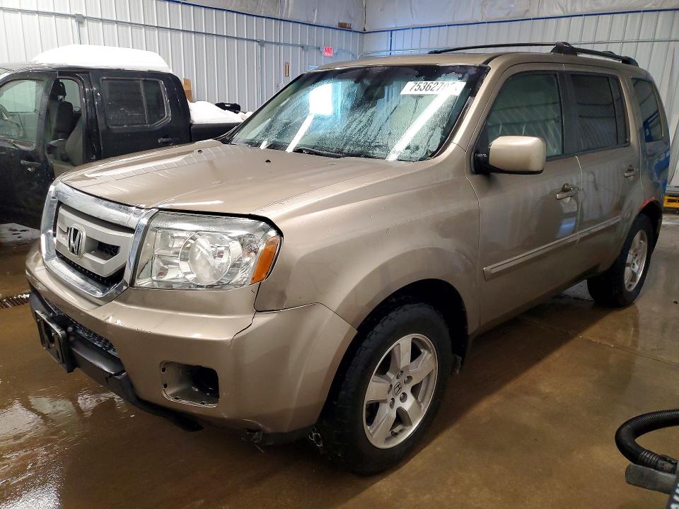 HONDA PILOT EXLN 2011 with VIN 5FNYF4H73BB051491 - Photo from auction