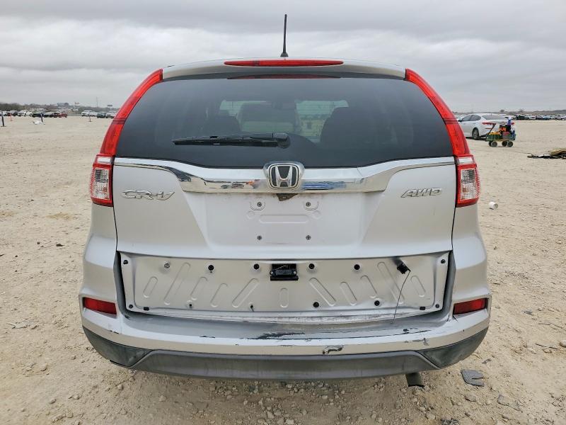 Photo 6 from auction – 2016 HONDA CR-V SE with VIN 2HKRM4H40GH659736