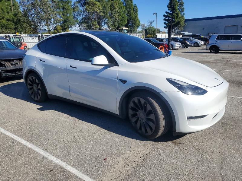 Photo 4 from auction – 2022 TESLA MODEL Y with VIN 7SAYGDEF8NF410172
