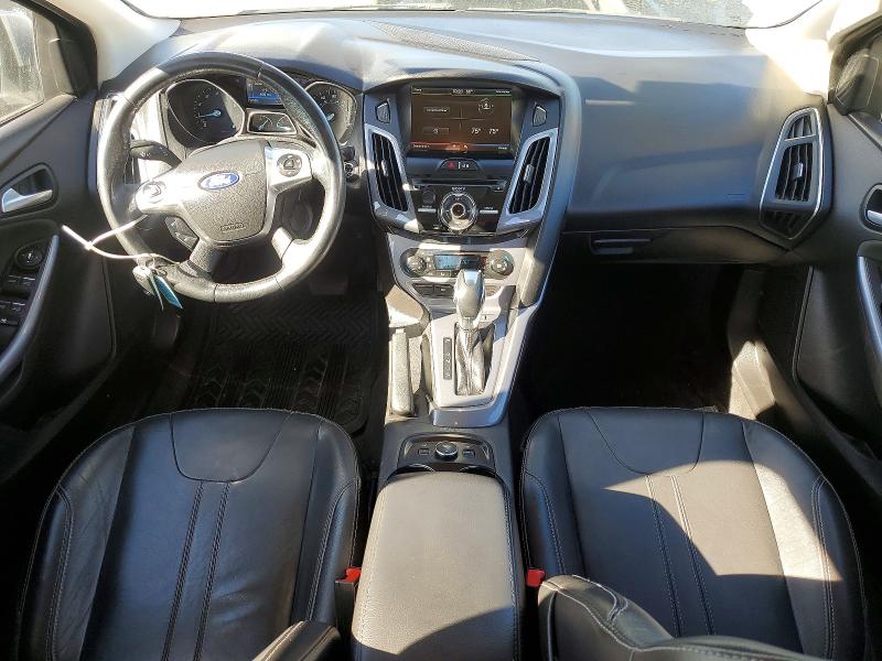 Photo 8 from auction – 2014 FORD FOCUS TITA with VIN 1FADP3J25EL384044
