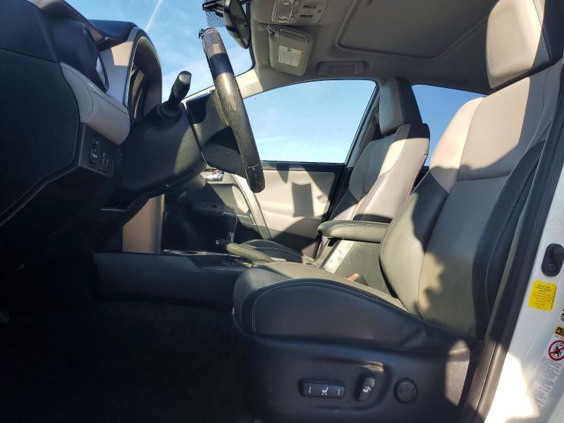 Photo 7 from auction – 2014 TOYOTA RAV4 with VIN JTMYFREV9EJ009162
