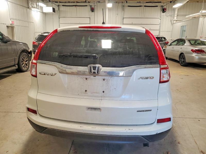 Photo 6 from auction – 2016 HONDA CR-V SE with VIN 5J6RM4H4XGL104864