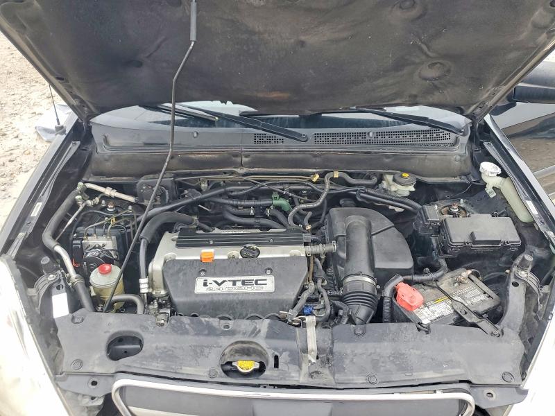 Photo 11 from auction – 2006 HONDA CR-V LX with VIN JHLRD68596C002435