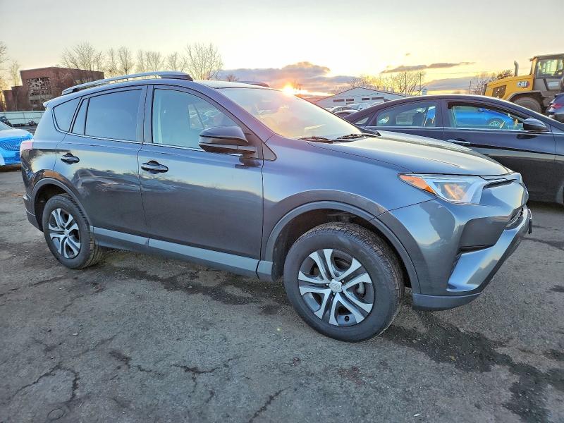 Photo 4 from auction – 2017 TOYOTA RAV4 LE with VIN JTMBFREV2HD201421