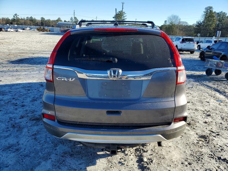 Photo 6 from auction – 2015 HONDA CR-V with VIN 2HKRM3H72FH501742