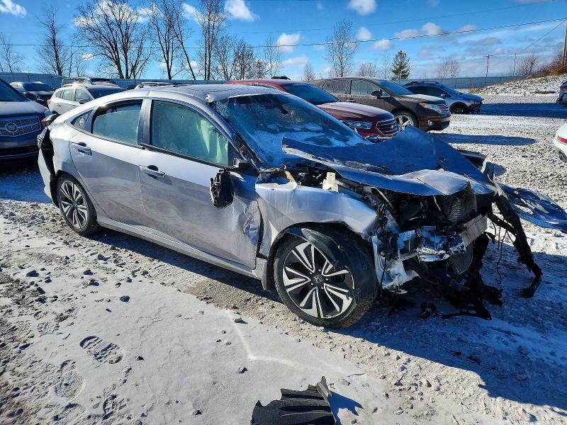 Photo 4 from auction – 2018 HONDA CIVIC EX with VIN JHMFC1F30JX024184