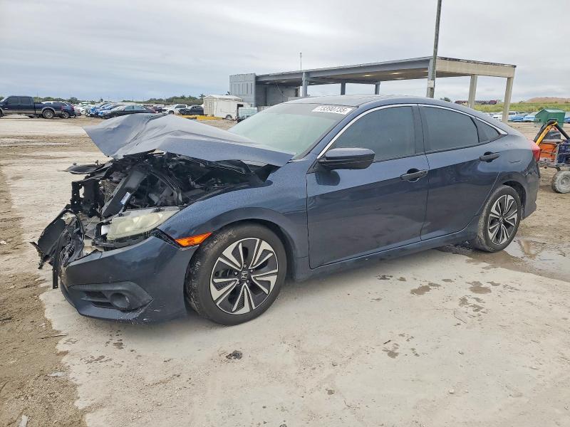 HONDA CIVIC EX 2017 with VIN 19XFC1F3XHE005704 - Photo from auction