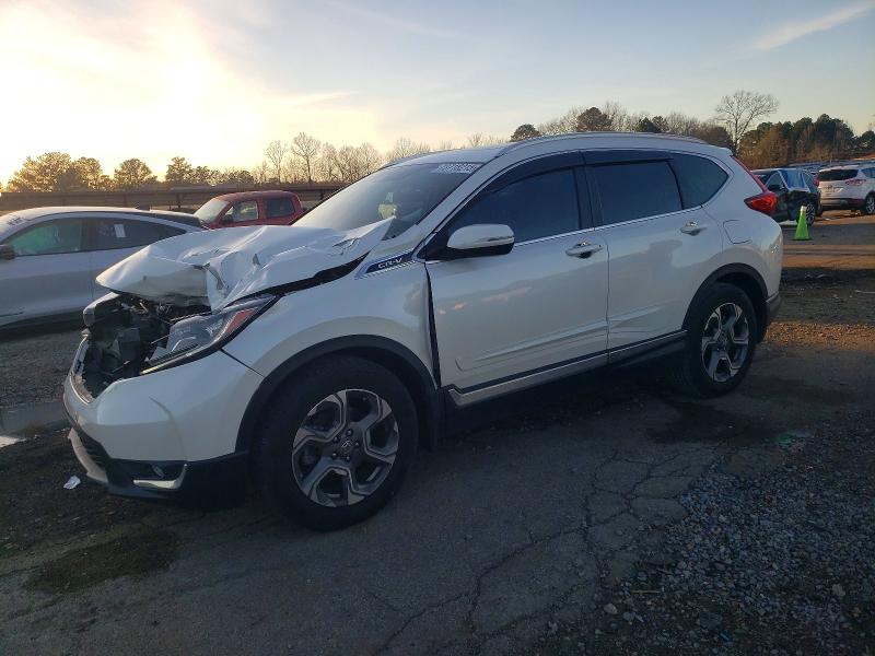 Photo 1 from auction – 2018 HONDA CR-V with VIN 5J6RW1H87JL012016