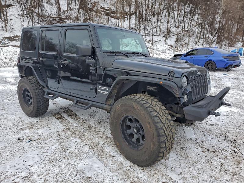 Photo 4 from auction – 2015 JEEP WRANGLER U with VIN 1C4HJWDG3FL520811