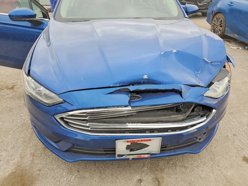 Photo 11 from auction – 2018 FORD FUSION S H with VIN 3FA6P0UU7JR142114