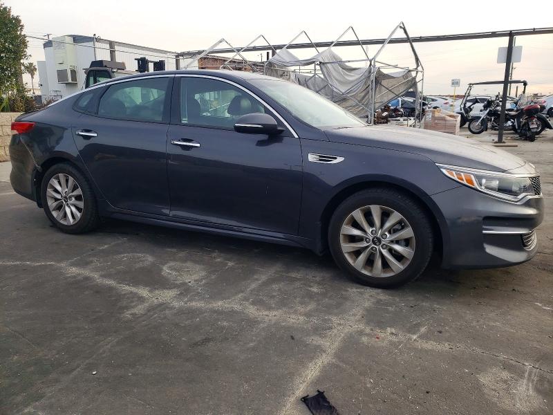 Photo 4 from auction – 2018 KIA OPTIMA with VIN 5XXGU4L38JG218333