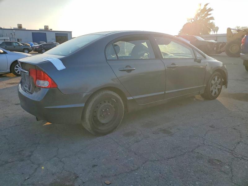 Photo 3 from auction – 2011 HONDA CIVIC with VIN 19XFA1F55BE031593