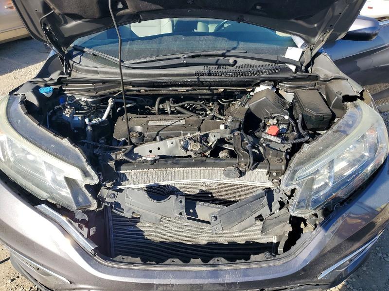 Photo 12 from auction – 2015 HONDA CR-V with VIN 2HKRM3H7XFH517803