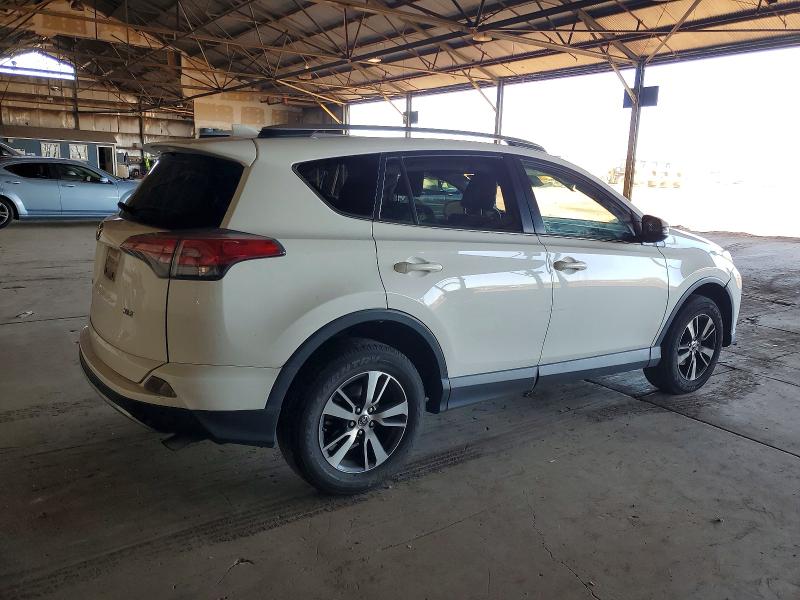 Photo 3 from auction – 2018 TOYOTA RAV4 with VIN JTMWFREV2JJ152973