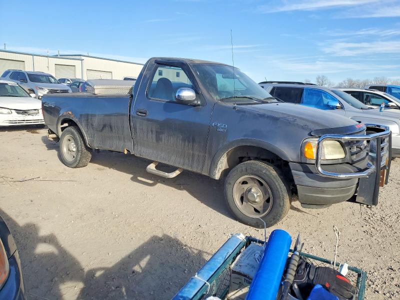 Photo 4 from auction – 2003 FORD F150 with VIN 2FTRF18W03CB06630