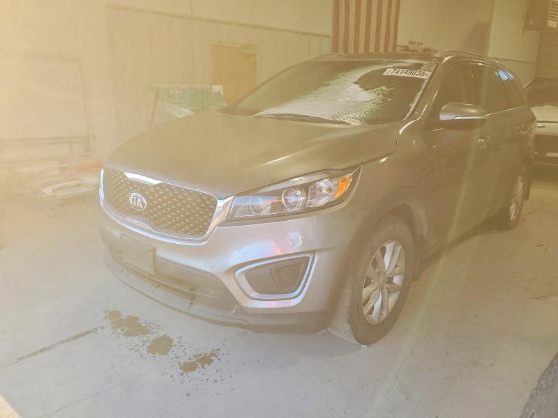 KIA SORENTO LX 2016 with VIN 5XYPGDA30GG001812 - Photo from auction