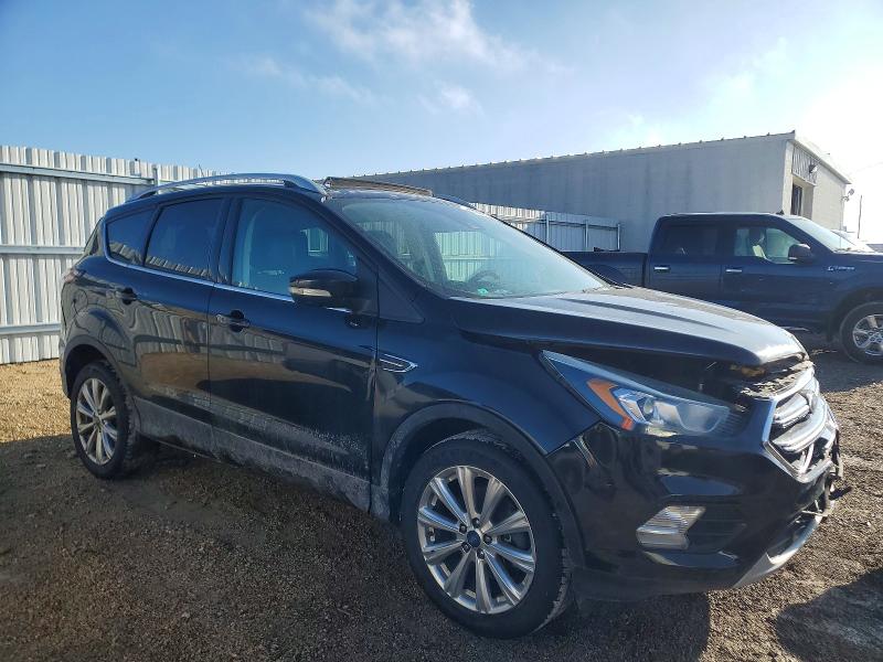 Photo 4 from auction – 2017 FORD ESCAPE with VIN 1FMCU9JD5HUB14342