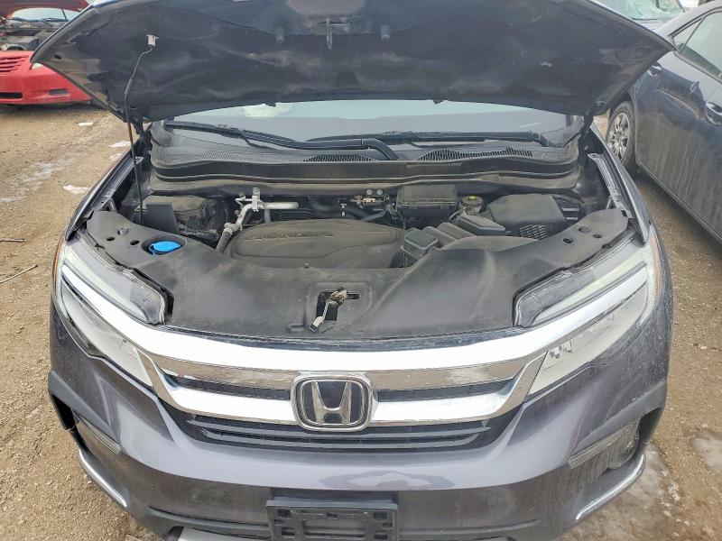 Photo 12 from auction – 2022 HONDA PILOT TOUR with VIN 5FNYF6H66NB007749