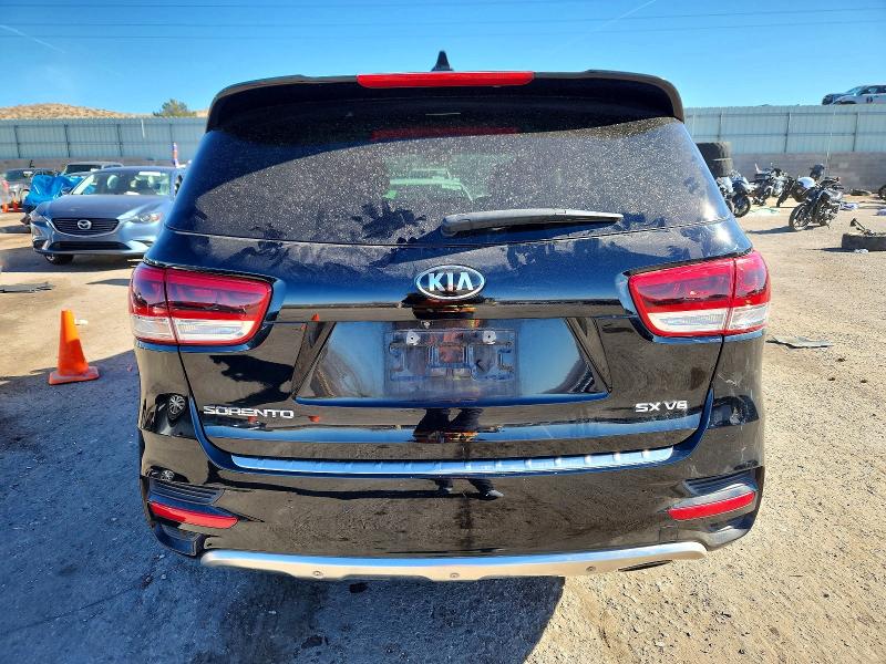 Photo 6 from auction – 2016 KIA SORENTO SX with VIN 5XYPKDA57GG105004