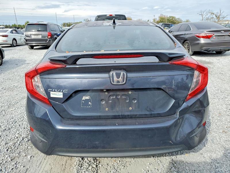Photo 6 from auction – 2018 HONDA CIVIC with VIN 2HGFC2F73JH606442