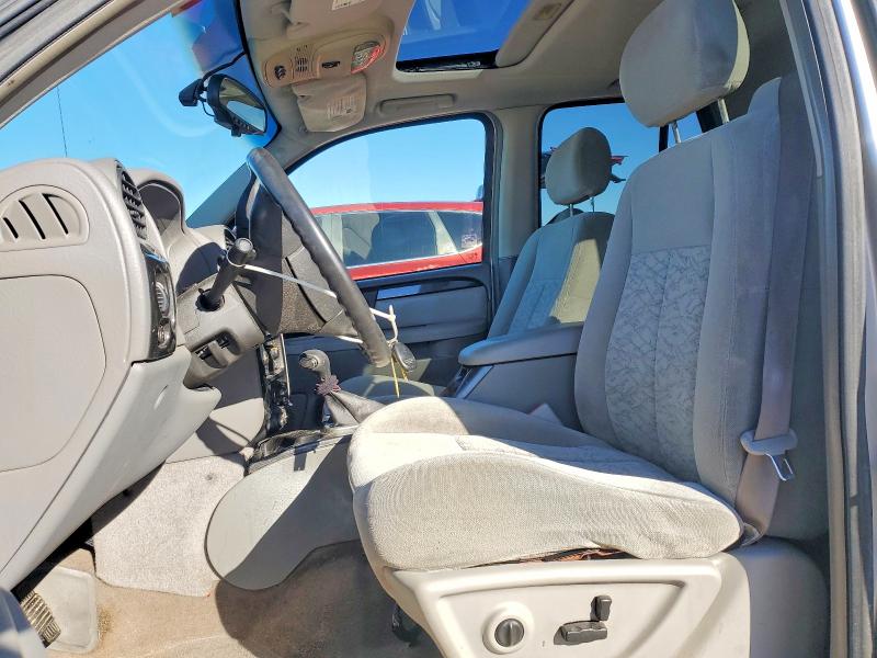 Photo 7 from auction – 2005 GMC ENVOY with VIN 1GKDS13S652341000
