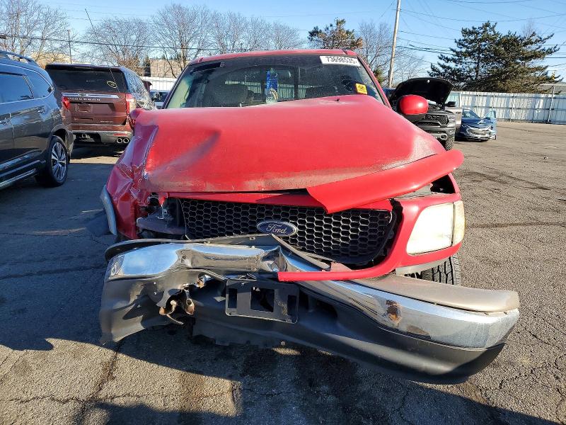 Photo 5 from auction – 2002 FORD F150 with VIN 1FTRW07LX2KB90421