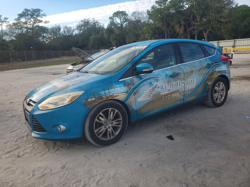 FORD FOCUS 2012 with VIN 1FAHP3M22CL184880 - Photo from auction