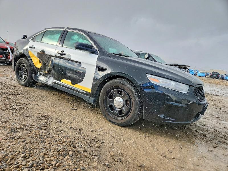 Photo 4 from auction – 2014 FORD TAURUS POL with VIN 1FAHP2MKXEG166617