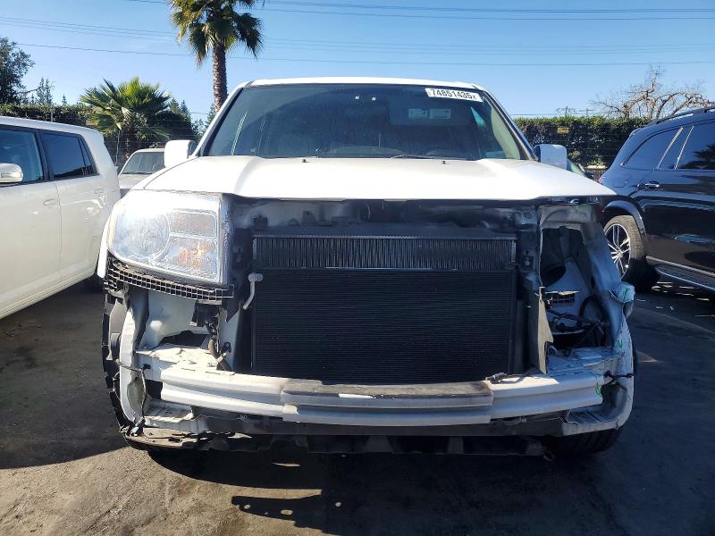 Photo 5 from auction – 2015 HONDA PILOT EX with VIN 5FNYF3H43FB020442
