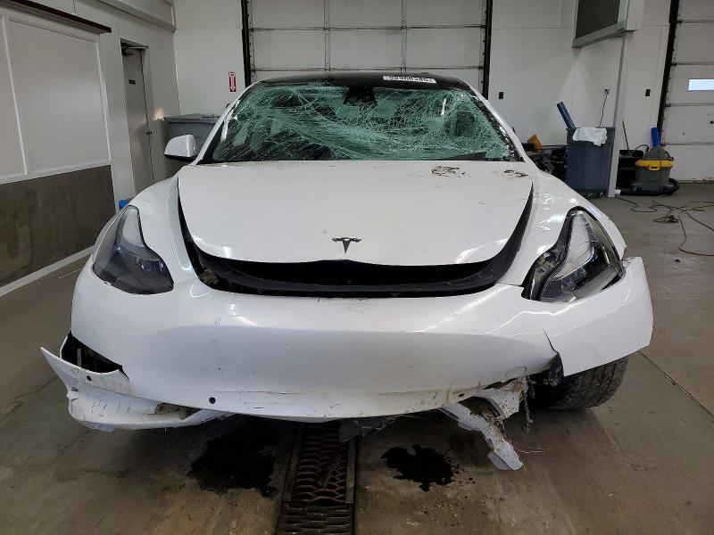 Photo 5 from auction – 2022 TESLA MODEL 3 with VIN 5YJ3E1EB4NF127731