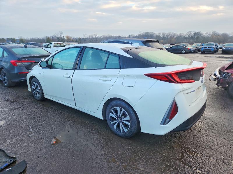 Photo 2 from auction – 2018 TOYOTA PRIUS PRIM with VIN JTDKARFP7J3083327