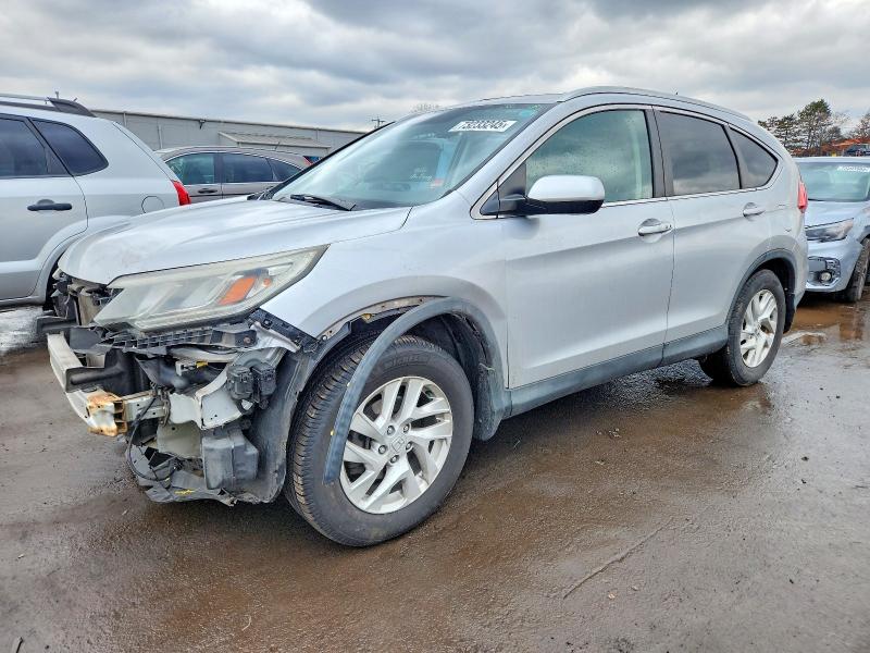 Photo 1 from auction – 2015 HONDA CR-V EXL with VIN 2HKRM4H79FH617395