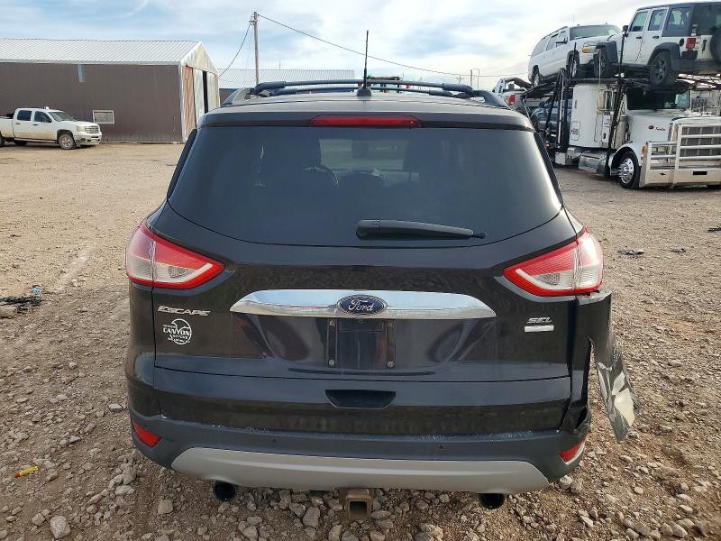 Photo 6 from auction – 2013 FORD ESCAPE SEL with VIN 1FMCU9H95DUA71990