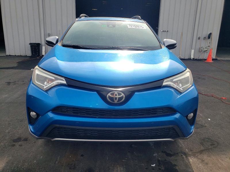 Photo 5 from auction – 2017 TOYOTA RAV4 SE with VIN 2T3NFREV5HW361129