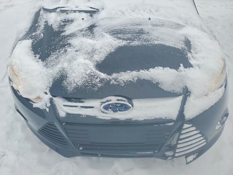 Photo 11 from auction – 2014 FORD FOCUS with VIN 1FADP3K22EL325659