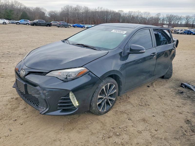 TOYOTA COROLLA LE 2017 with VIN 5YFBURHE5HP678147 - Photo from auction