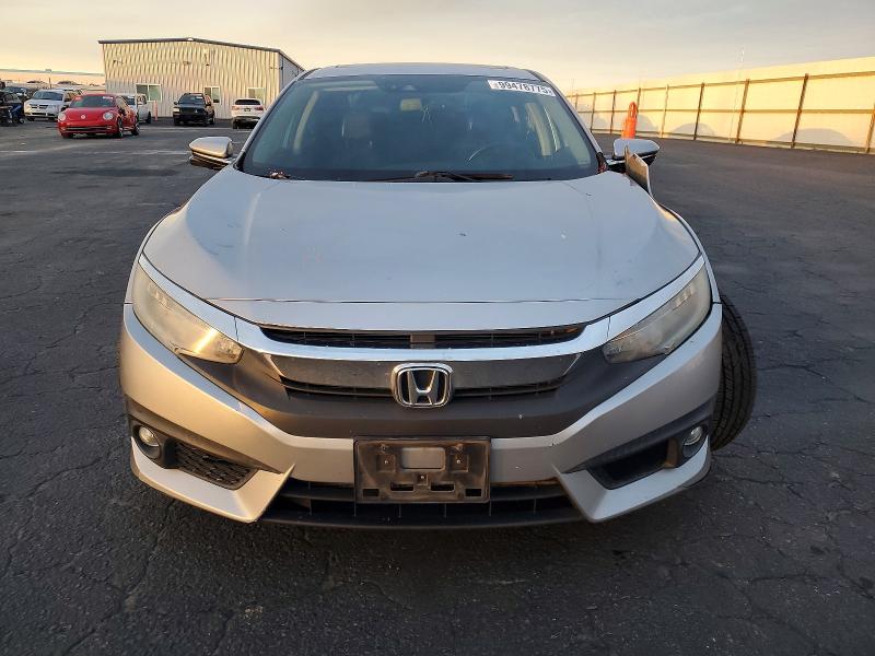 Photo 5 from auction – 2017 HONDA CIVIC TOUR with VIN 19XFC1F91HE204693