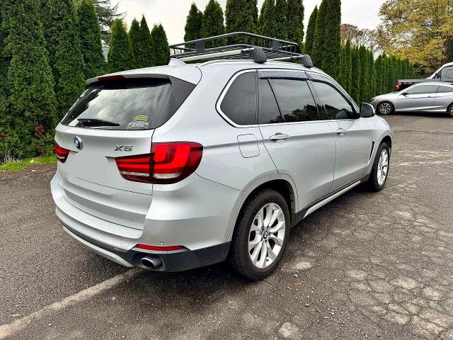 Photo 4 from auction – 2015 BMW X5 with VIN 5UXKR0C56F0P09402