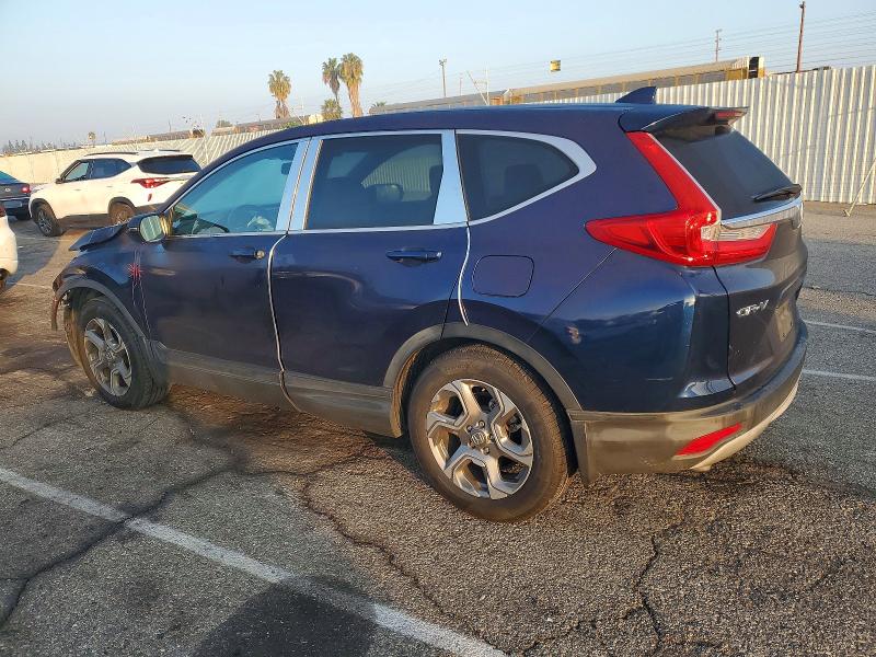 Photo 2 from auction – 2017 HONDA CR-V with VIN 7FARW1H83HE041147