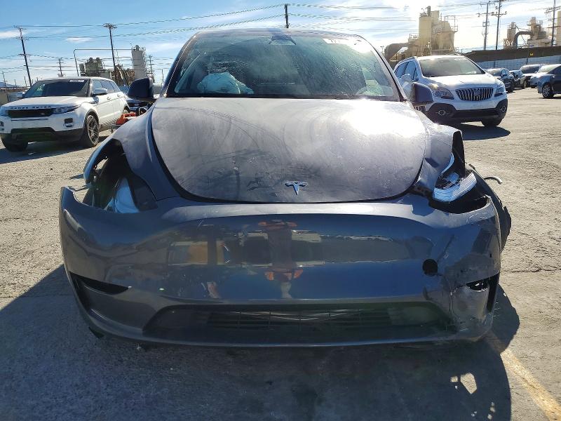 Photo 5 from auction – 2022 TESLA MODEL Y with VIN 7SAYGDEE6NF571045