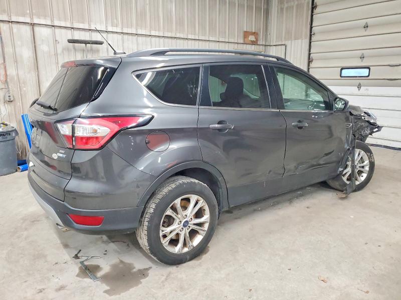 Photo 3 from auction – 2018 FORD ESCAPE with VIN 1FMCU9GD7JUC60965