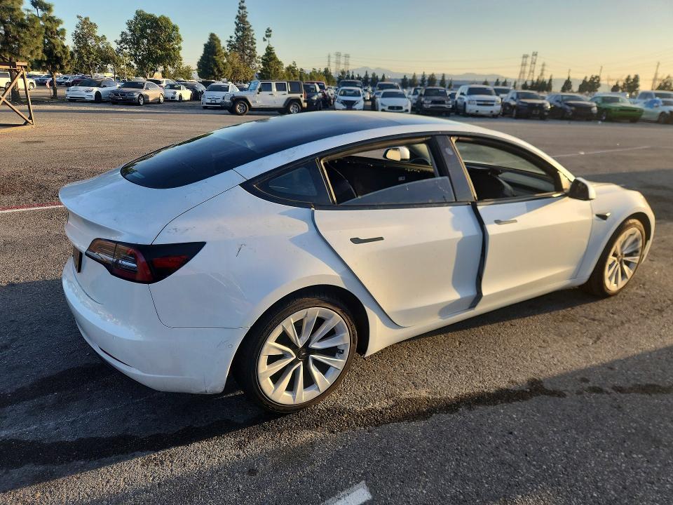 Photo 3 from auction – 2021 TESLA MODEL 3 with VIN 5YJ3E1EA9MF982690