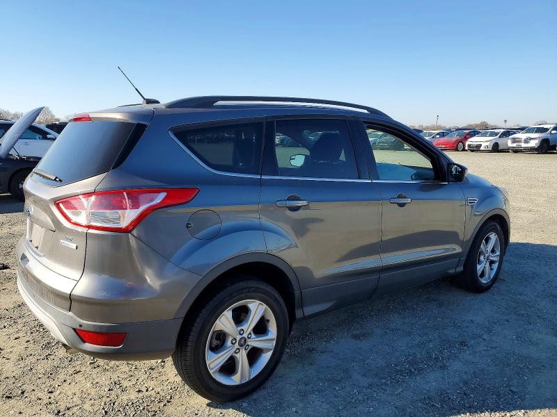 Photo 3 from auction – 2014 FORD ESCAPE SE with VIN 1FMCU0GX0EUB09560