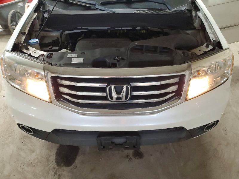 Photo 12 from auction – 2013 HONDA PILOT TOUR with VIN 5FNYF4H91DB021054